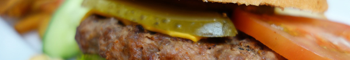 Eating American (Traditional) Burger at Fairport Hots restaurant in Fairport, NY.
